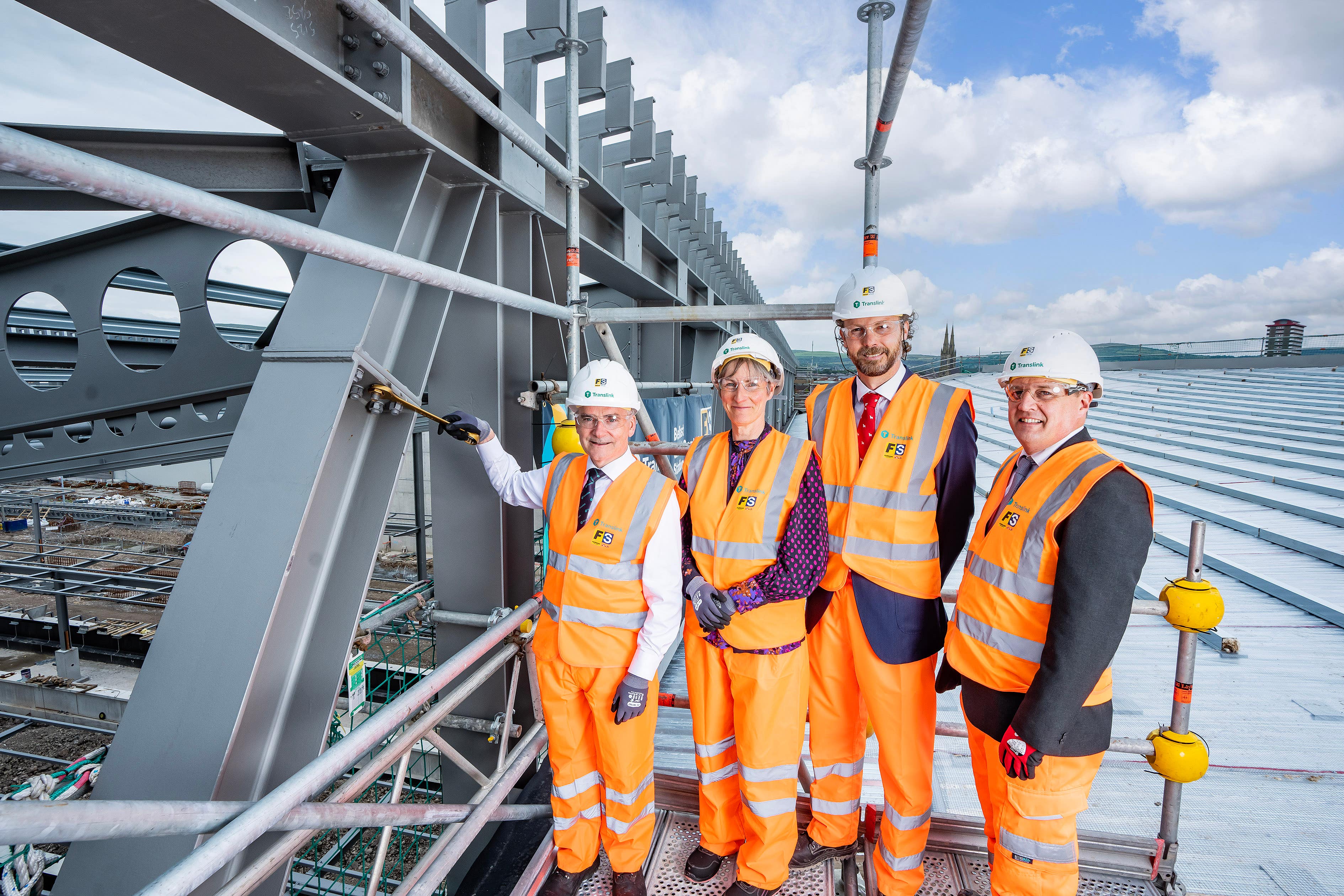 Translink and the Department for Infrastructure recently joined hosts and construction partner Farrans Sacyr for a traditional ‘topping out’ ceremony at the new Belfast Grand Central Station (Brian Morrison)