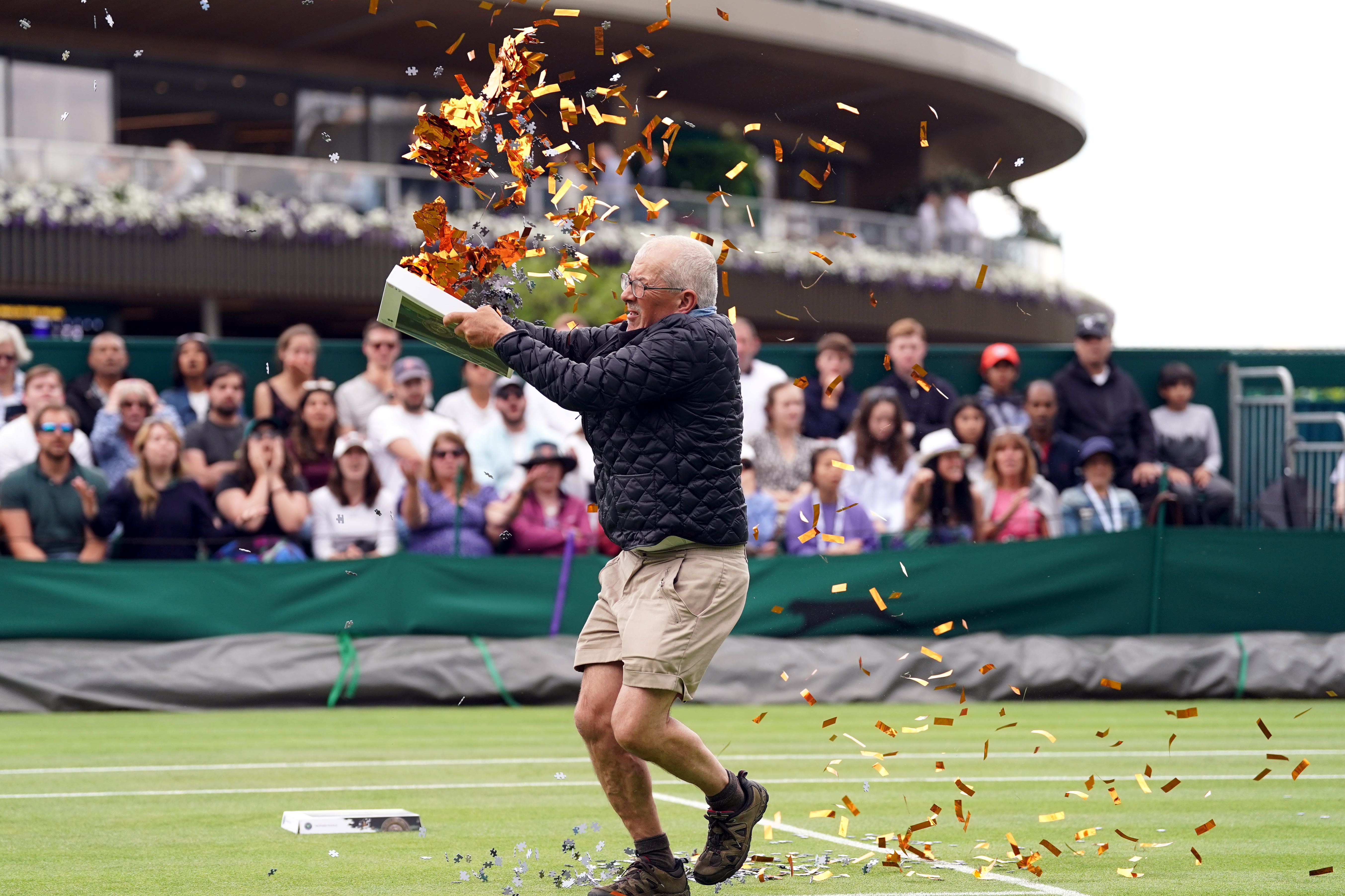 A Just Stop Oil protester interrupts match play at Wimbledon