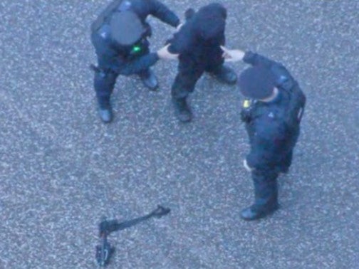 The moment Chail was arrested, with his weapon on the ground