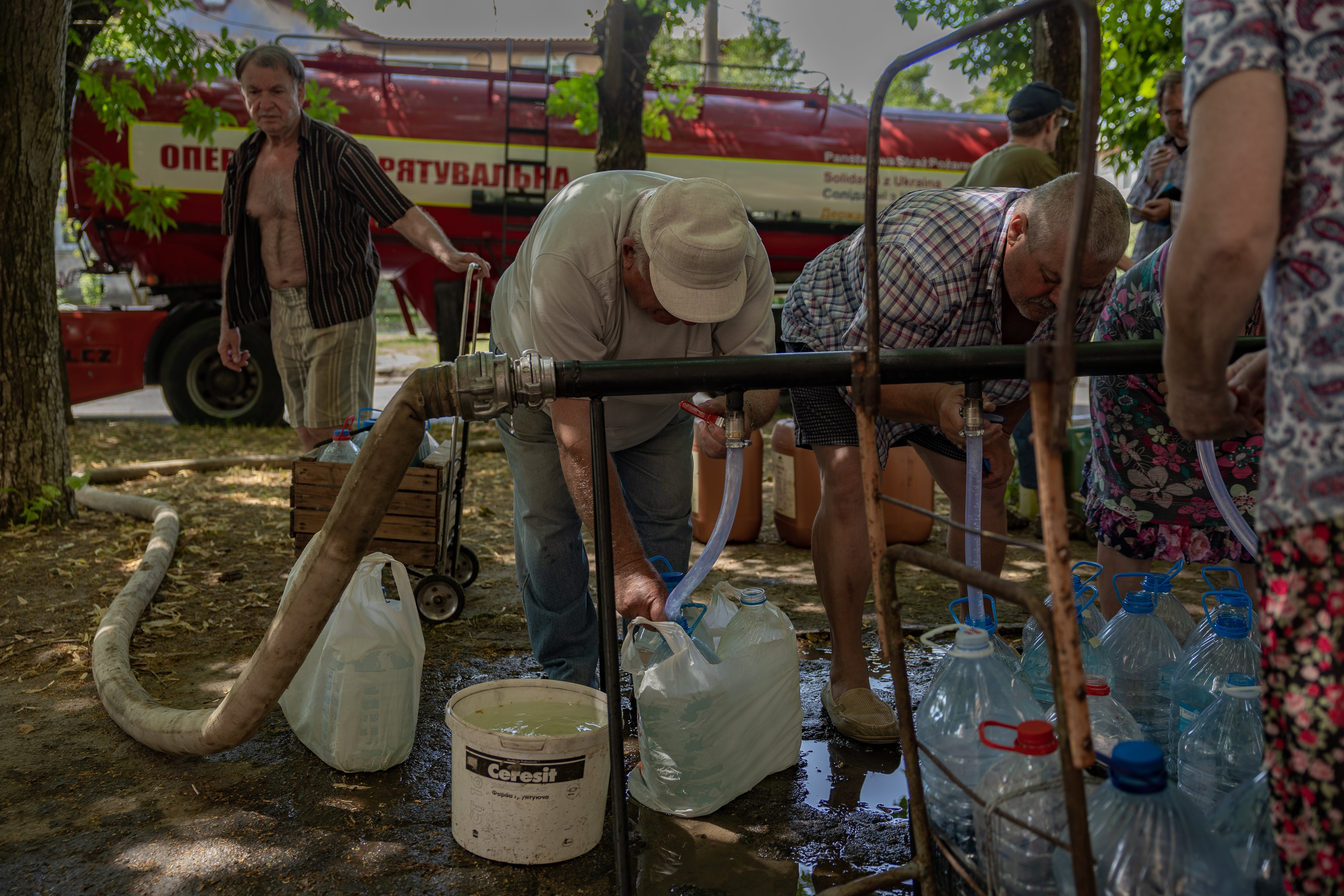 Civilians in Nikopol are forced to get water from firetrucks, face daily shelling and now the threat of the nearby nuclear power plant