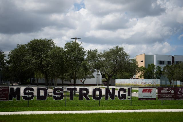 <p>Letters on a fence read ‘MSD Strong’ outside Marjory Stoneman Douglas High School in Parkland, Fla., Wednesday, July 5, 2023.</p>