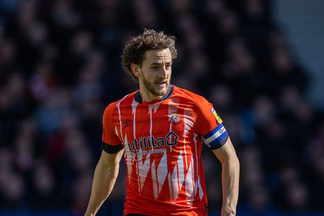 Tom Lockyer has agreed a new contract with Luton (Steven Paston/PA)