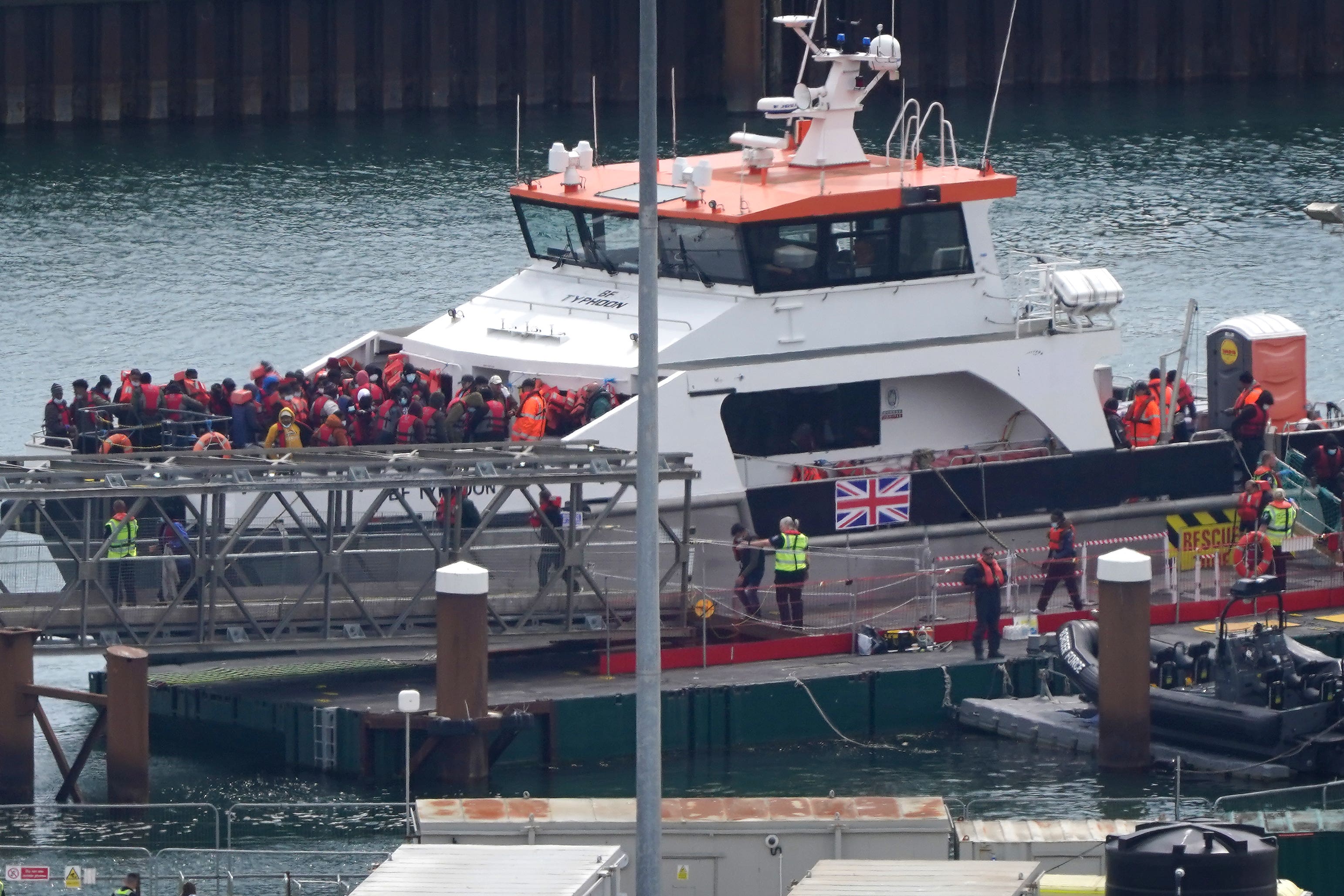 Migrants are brought in to Dover, Kent, by a Border Force vessel