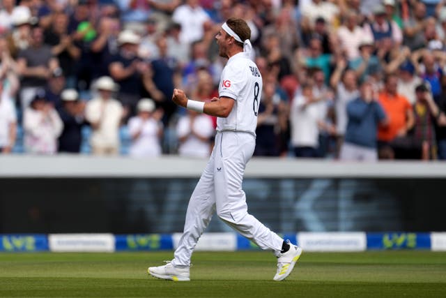 England’s Stuart Broad celebrates after taking the wicket of David Warner once again (Danny Lawson/PA)