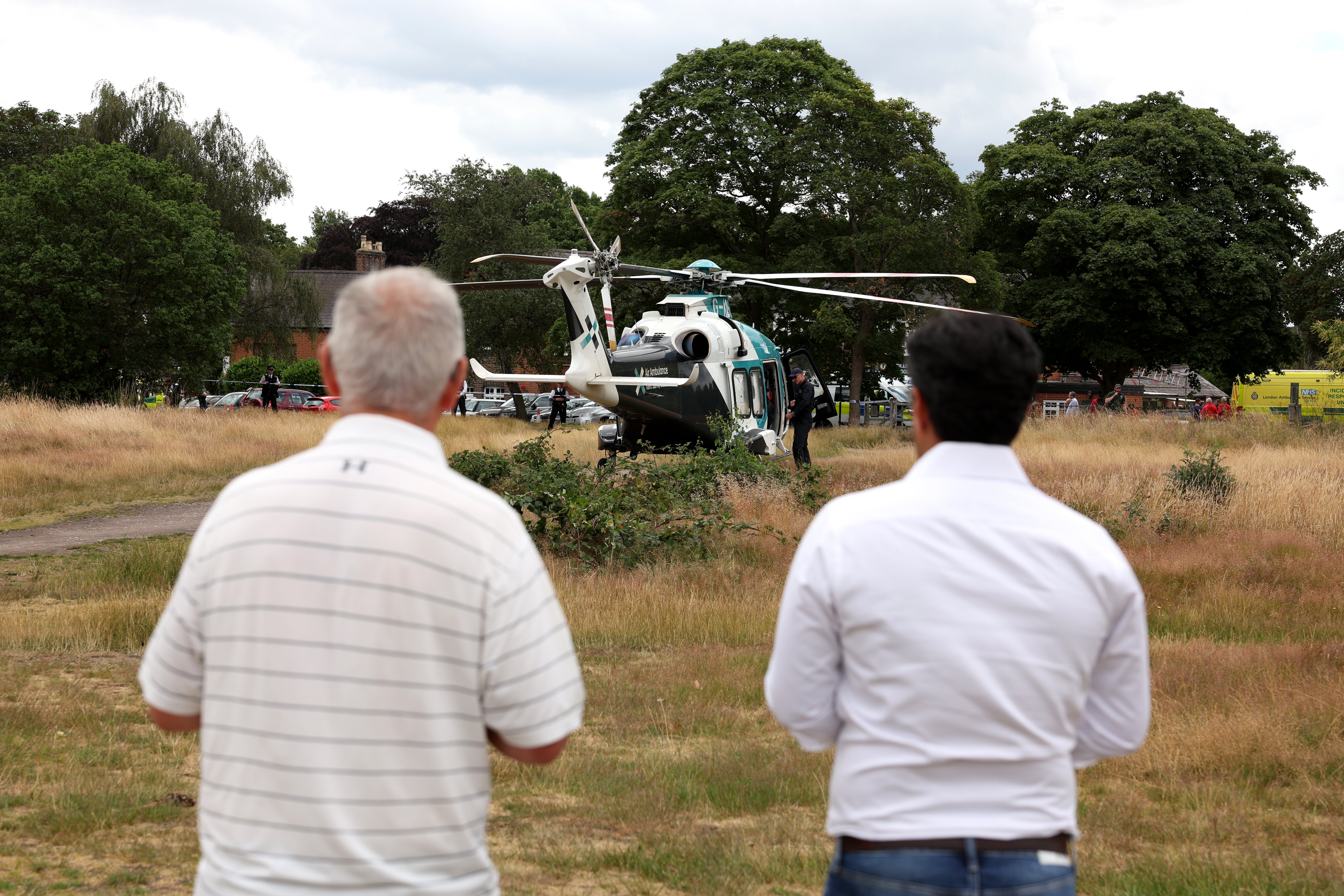An air ambulance lands on Wimbledon Common