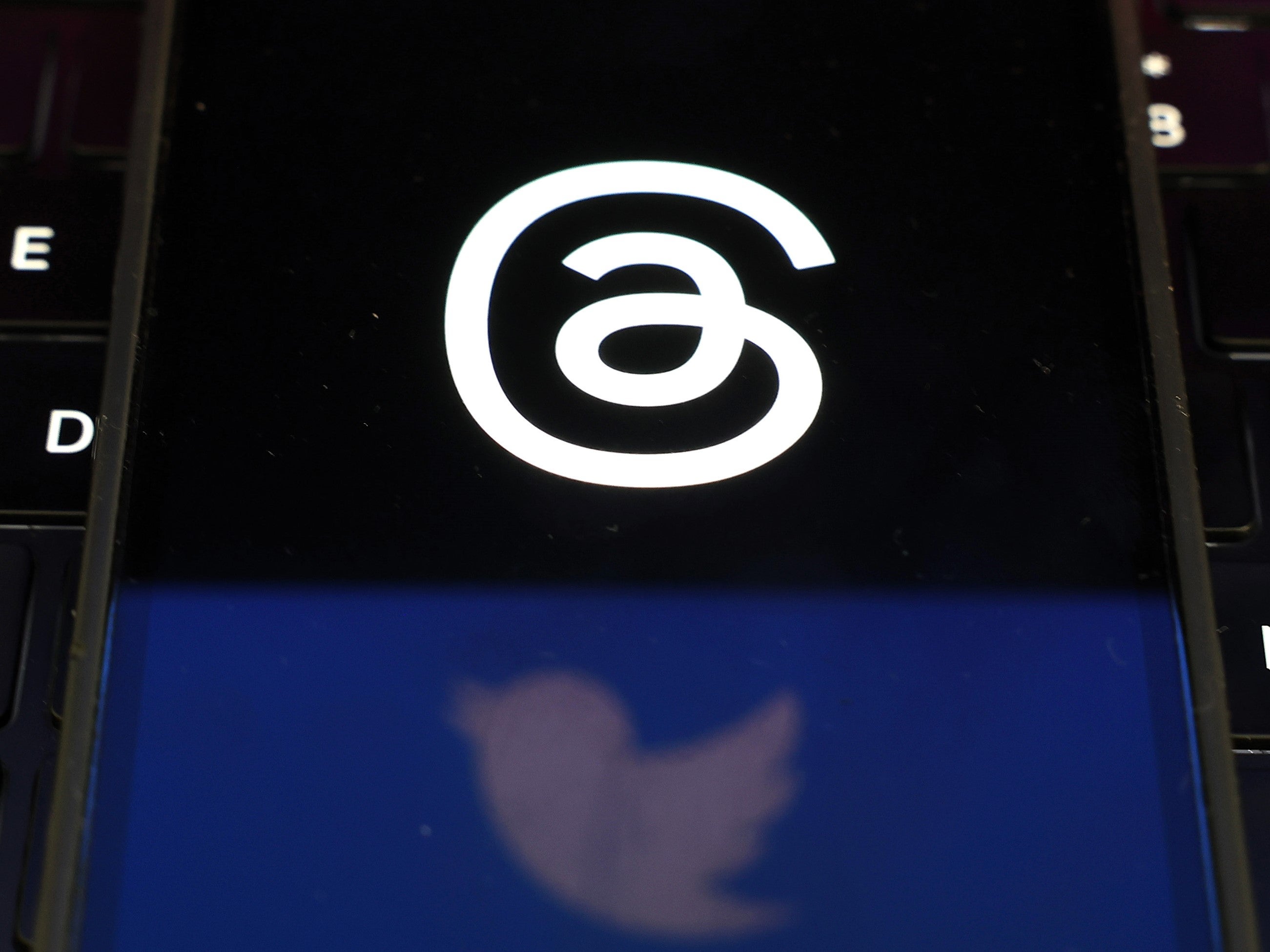 Twitter and Threads logos are displayed on a cell phone on 5 July, 2023 in San Anselmo, California