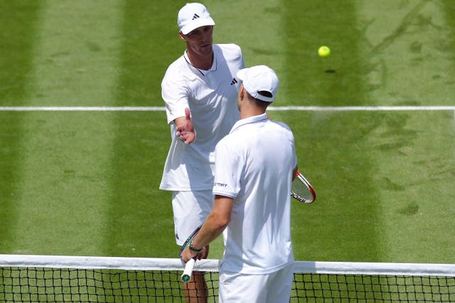 Hubert Hurkacz beat his former doubles partner Jan Choinski (left) in the second round at Wimbledon (John Walton/PA)