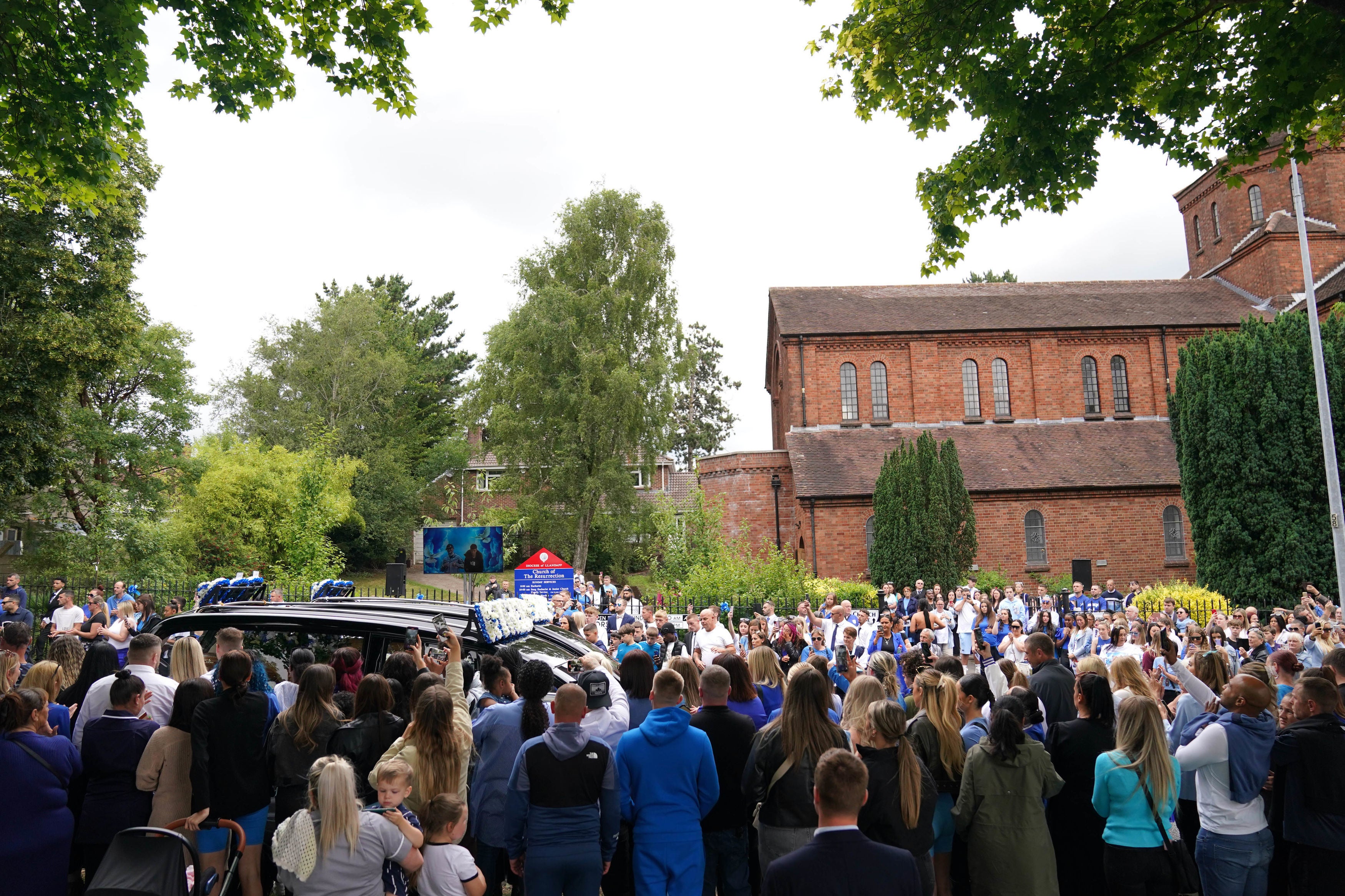 Mourners at the funeral of Kyrees Sullivan and Harvey Evans at the Church of the Resurrection in Ely