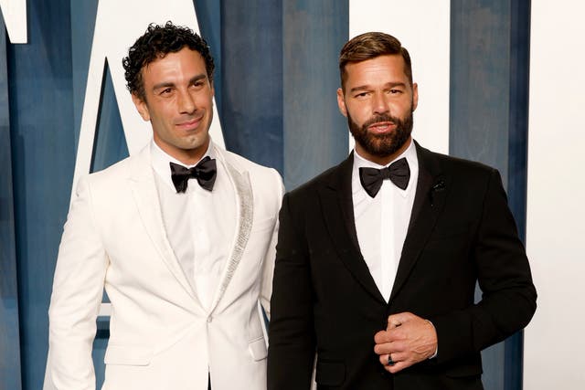 <p>Jwan Yosef and Ricky Martin attend the 2022 Vanity Fair Oscar Party hosted by Radhika Jones at Wallis Annenberg Center for the Performing Arts on March 27, 2022</p>
