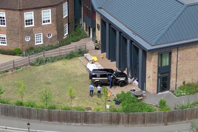 <p>A Land Rover Defender is seen inside the grounds of The Study Preparatory School in Camp Road, Wimbledon</p>