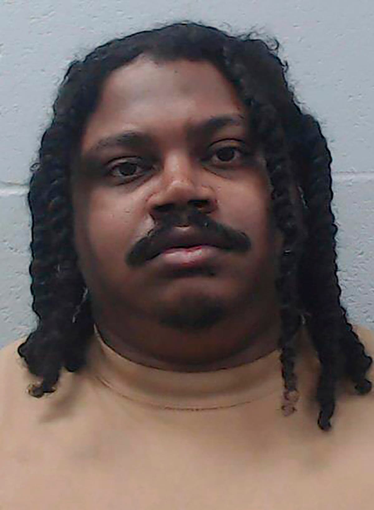 Texas officials name suspect arrested and charged in arson that killed