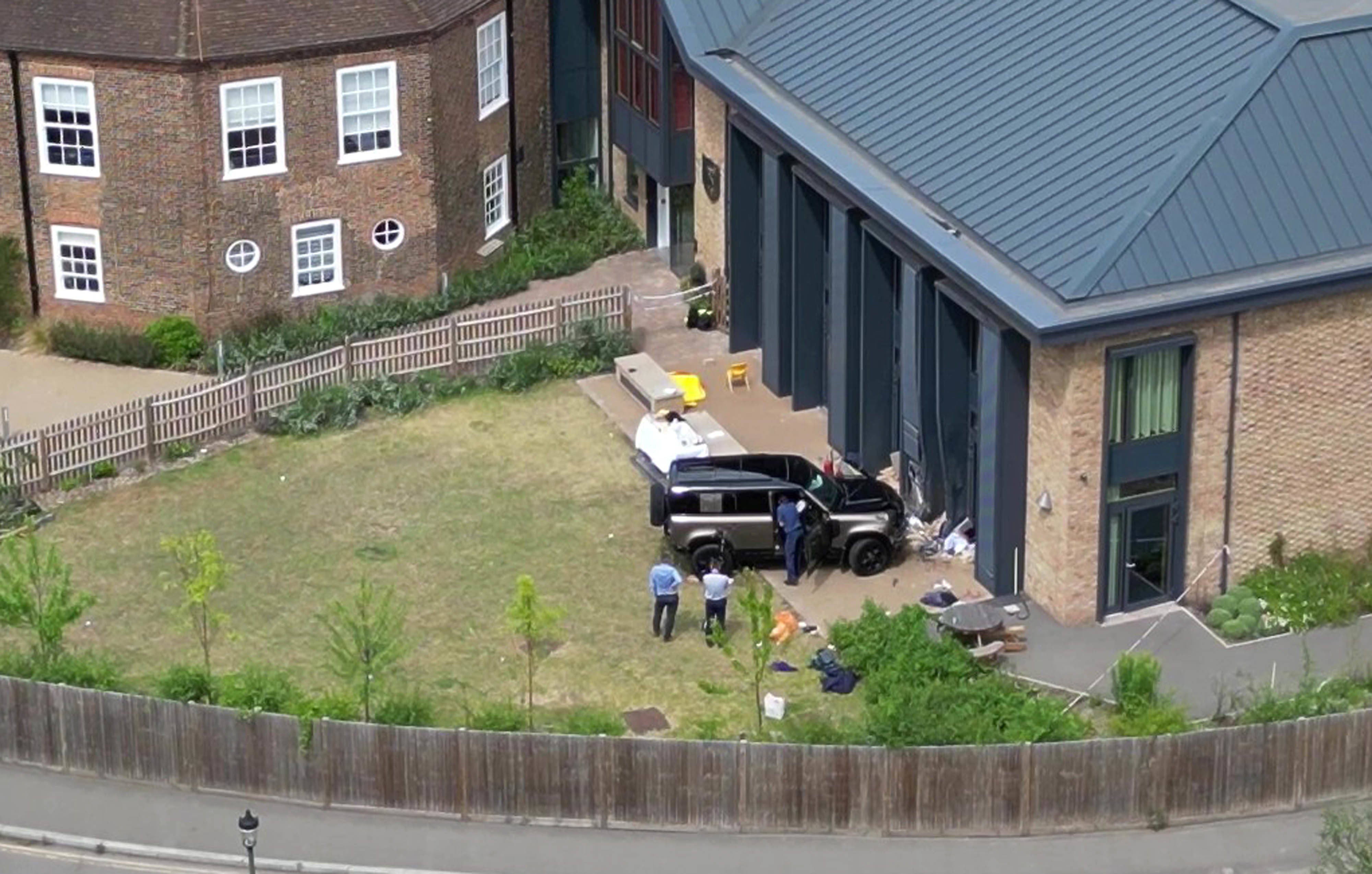 A Land Rover Defender is seen inside the grounds of The Study Preparatory School in Camp Road, Wimbledon