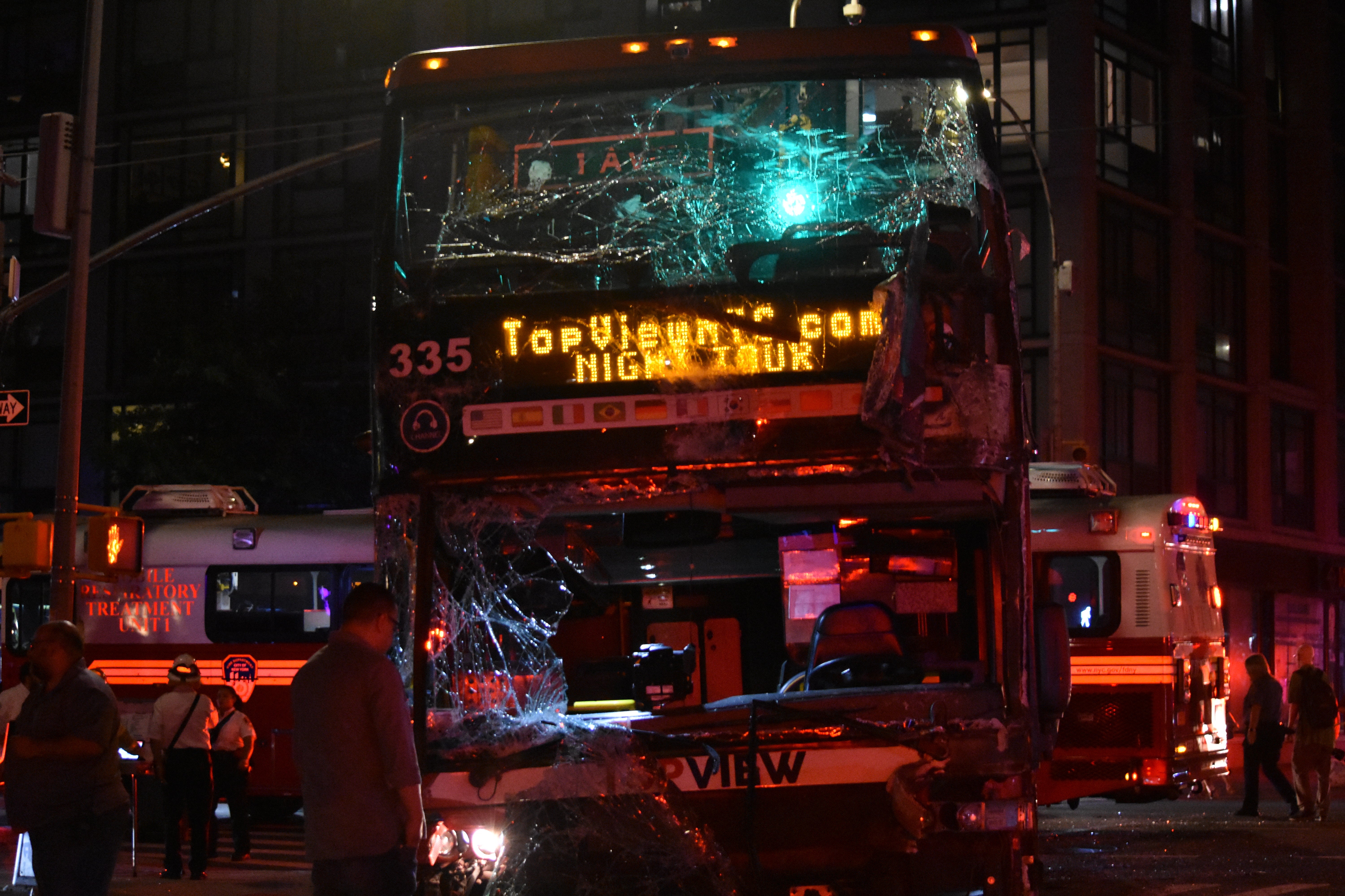 Multiple people injured in a crash involving a MTA bus and a double decker tour bus in Manhattan, New York