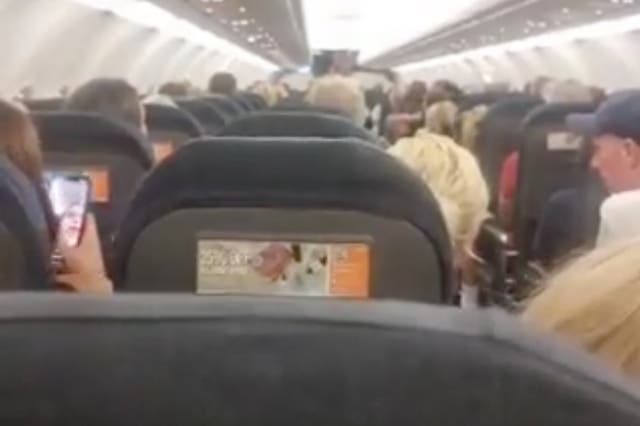 <p>The pilot explains the situation to passengers </p>