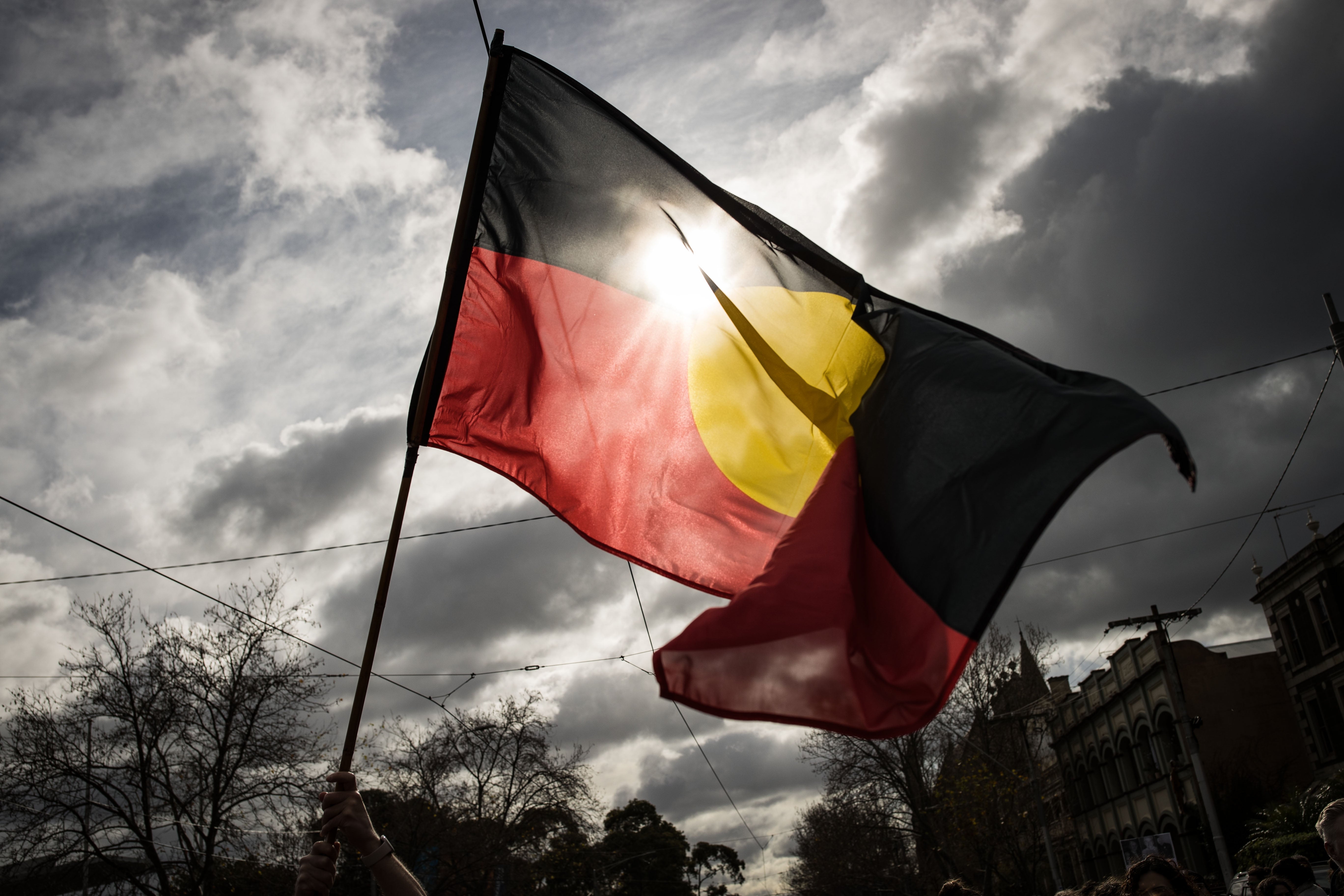 The Aboriginal flag is seen flying in Melbourne, Australia
