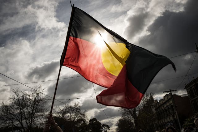<p>The Aboriginal flag is seen flying in Melbourne, Australia</p>