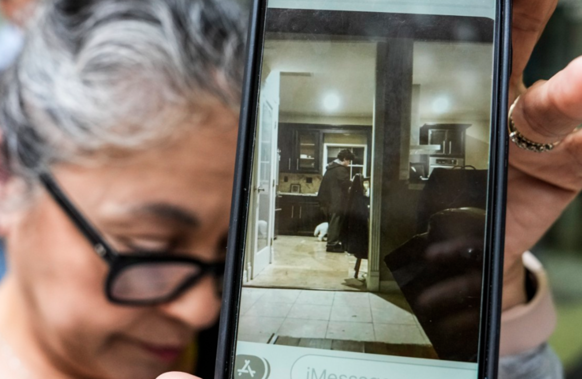Rudy Farias‘ aunt Sylvia Sanchez Lopez shows an image on a her cellphone, she said Houston Police sent her in a text allegedly showing Farias