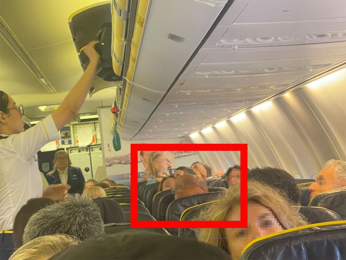 Police haul man off Ryanair flight after he shouted at mother trying to console baby