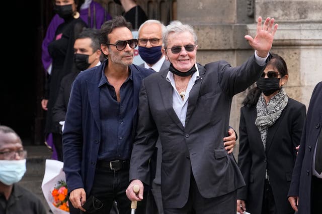 <p>French actor Alain Delon and his son Anthony Delon, left, arrive at the Saint Germain des Près church</p>
