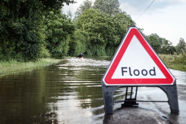 The Met Office has warned that forecast thunderstorms could bring flash flooding (Alamy/PA)