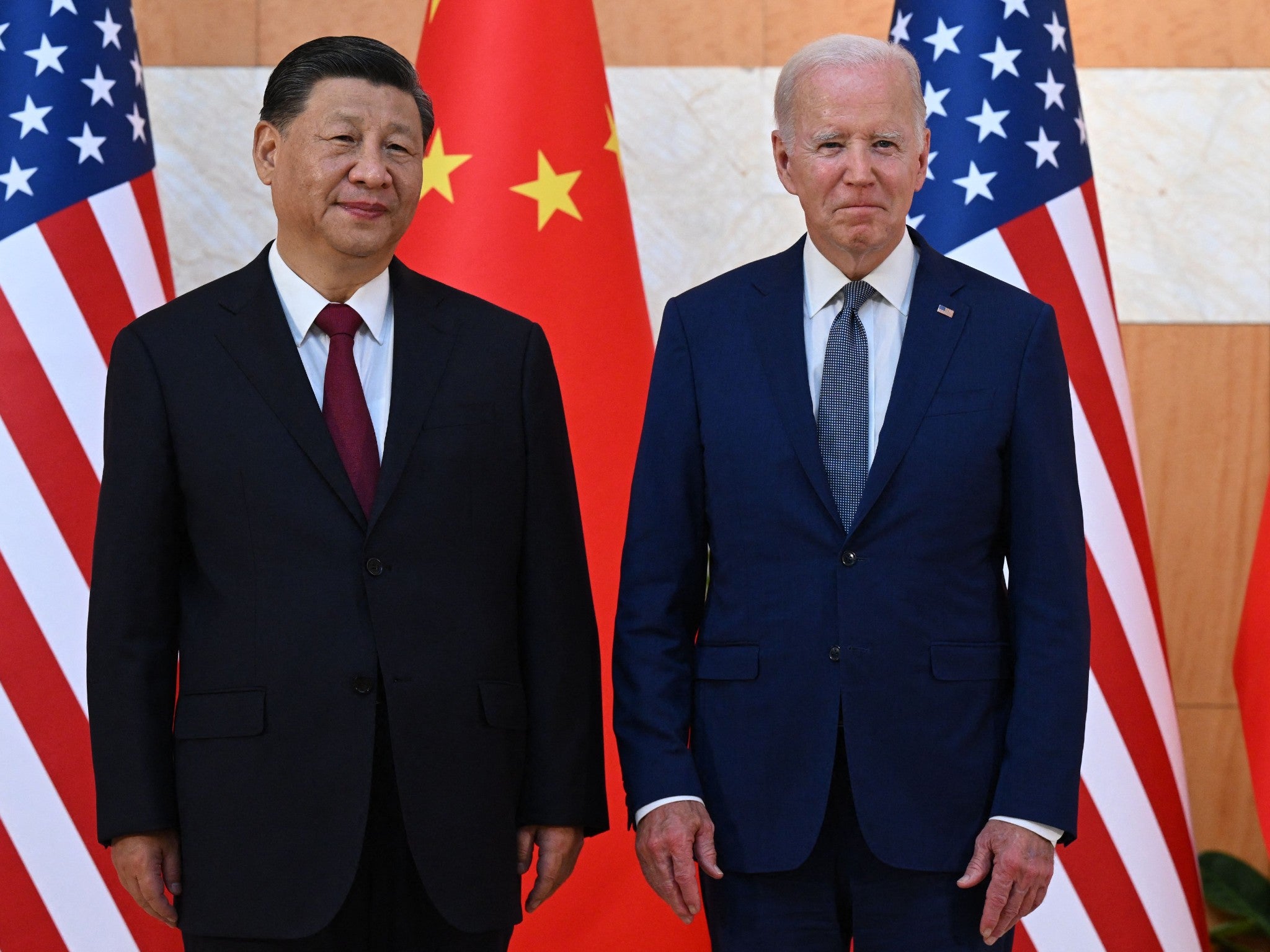 Joe Biden, right, and Xi Jinping met on the sidelines of a G20 summit late last year – but the economic tit-for-tat has continued between the US and China