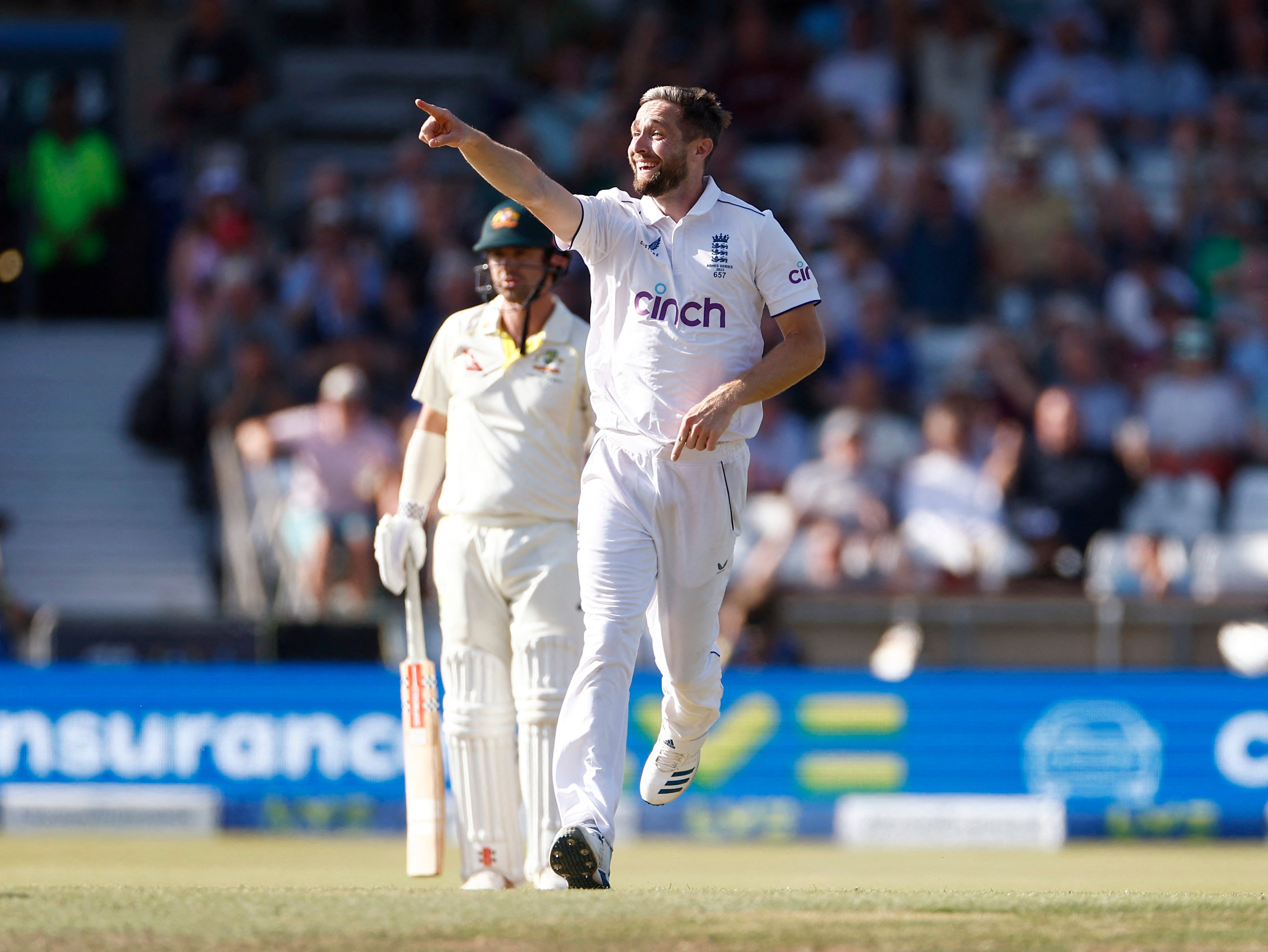 Chris Woakes dismissed the dangerous Usman Khawaja late in the day