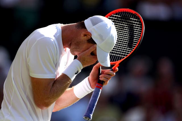 Andy Murray looks dejected during his match against Stefanos Tsitsipas (Steven Paston/PA)