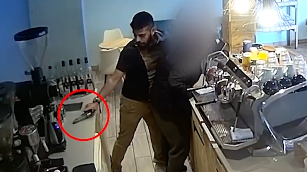 <p>Off-duty officer disarms gunman in Birmingham coffee shop</p>