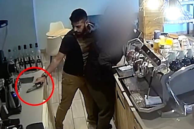 <p>Off-duty officer disarms gunman in Birmingham coffee shop</p>