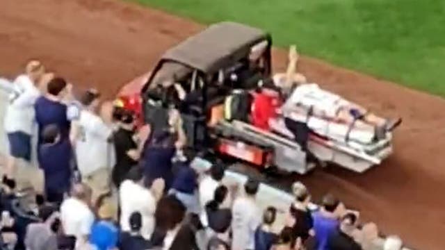 <p>Yankees cameraman stretchered off pitch after being hit in head by baseball</p>