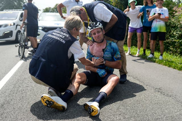 Mark Cavendish is out of his final Tour de France after a stage eight crash (Thibault Camus/AP)