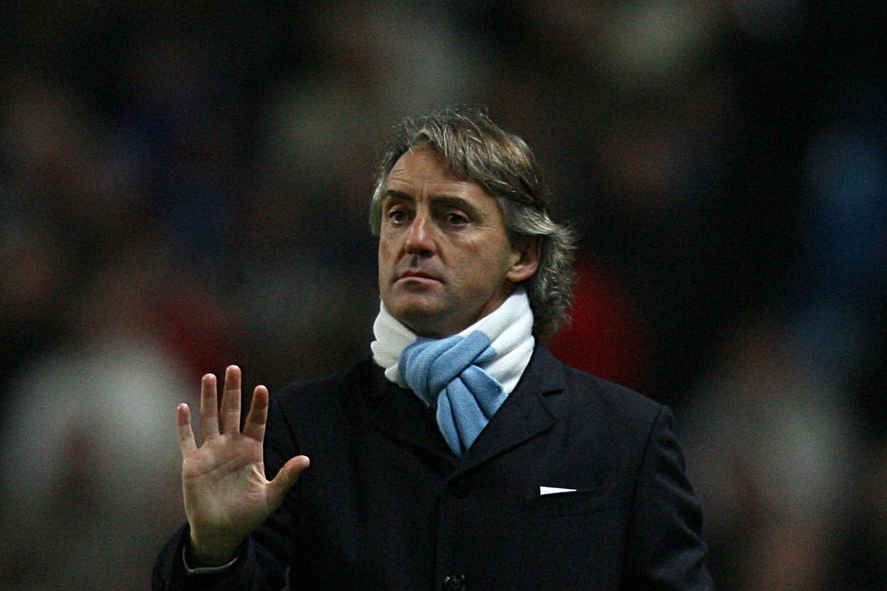 Roberto Mancini signed a new five-year contract at Manchester City – only to be sacked 10 months later (Martin Rickett/PA)