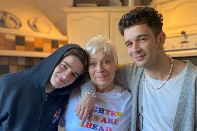 <p>Denishe Welch with her two sons, Louis Healy (left) and Matty Healy</p>