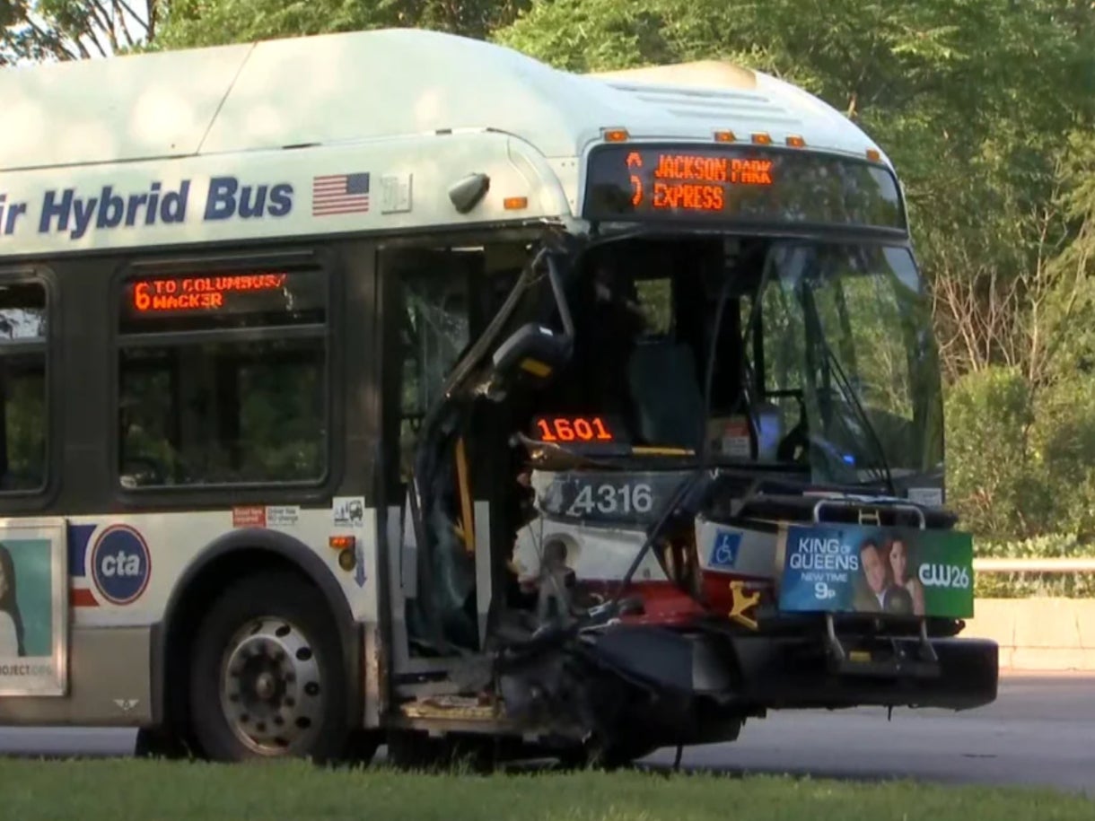 A damaged bus is seen after colliding with a car in Chicago