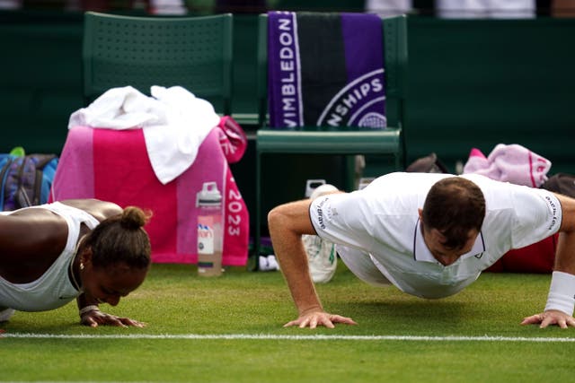 Jamie Murray (right) and Taylor Townsend celebrate with press-ups (Victoria Jones/PA)