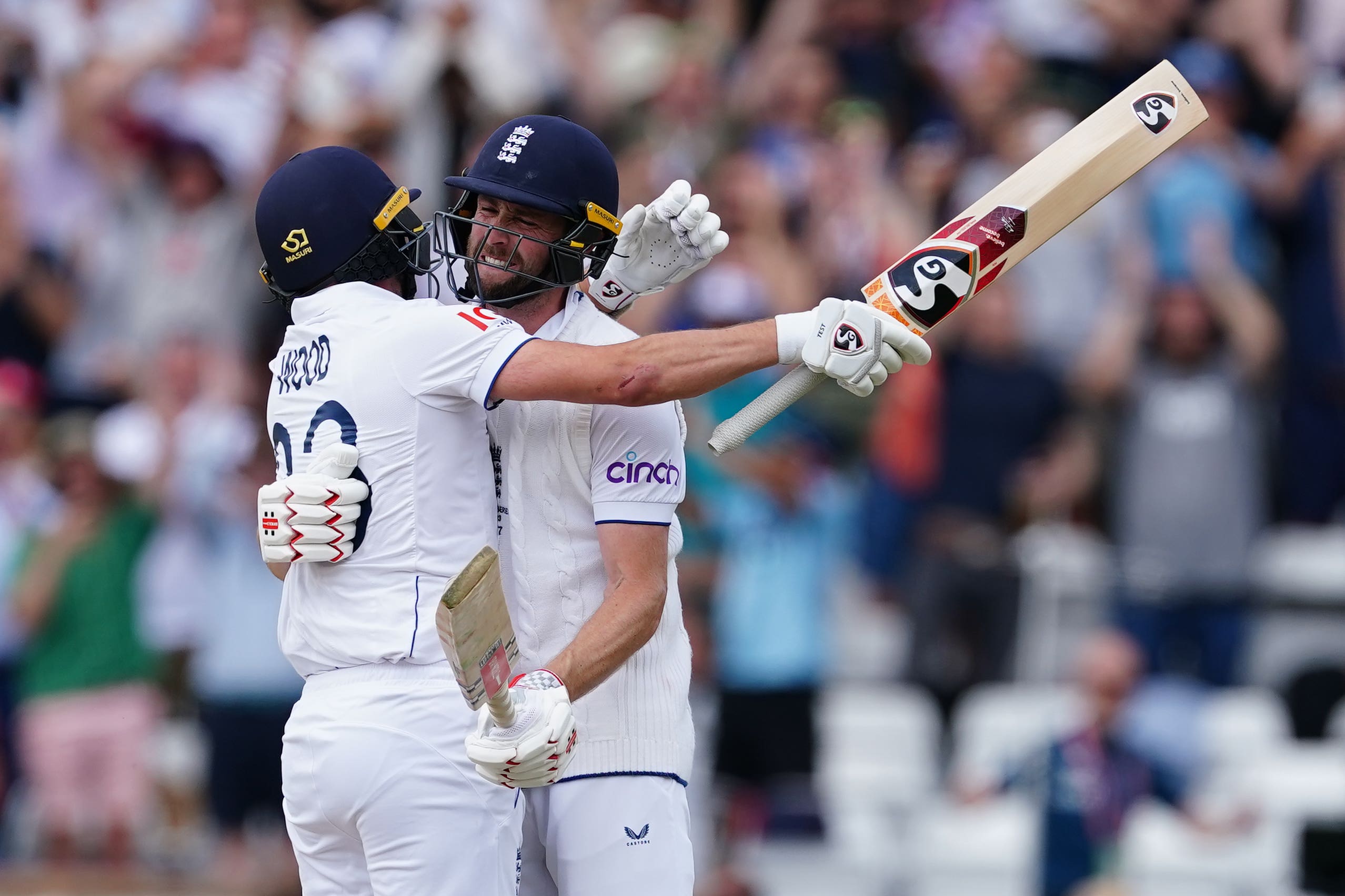 England’s Chris Woakes and Mark Wood (left) celebrate (Mike Egerton/PA)