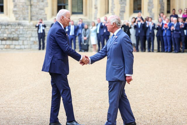Joe Biden shakes hands with the King (Chris Jackson/PA)