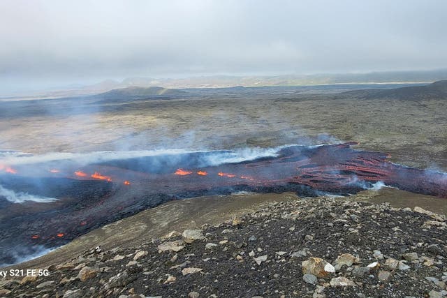 <p>Lava flows as a volcano erupts on the Reykjanes peninsula in southwest Iceland</p>