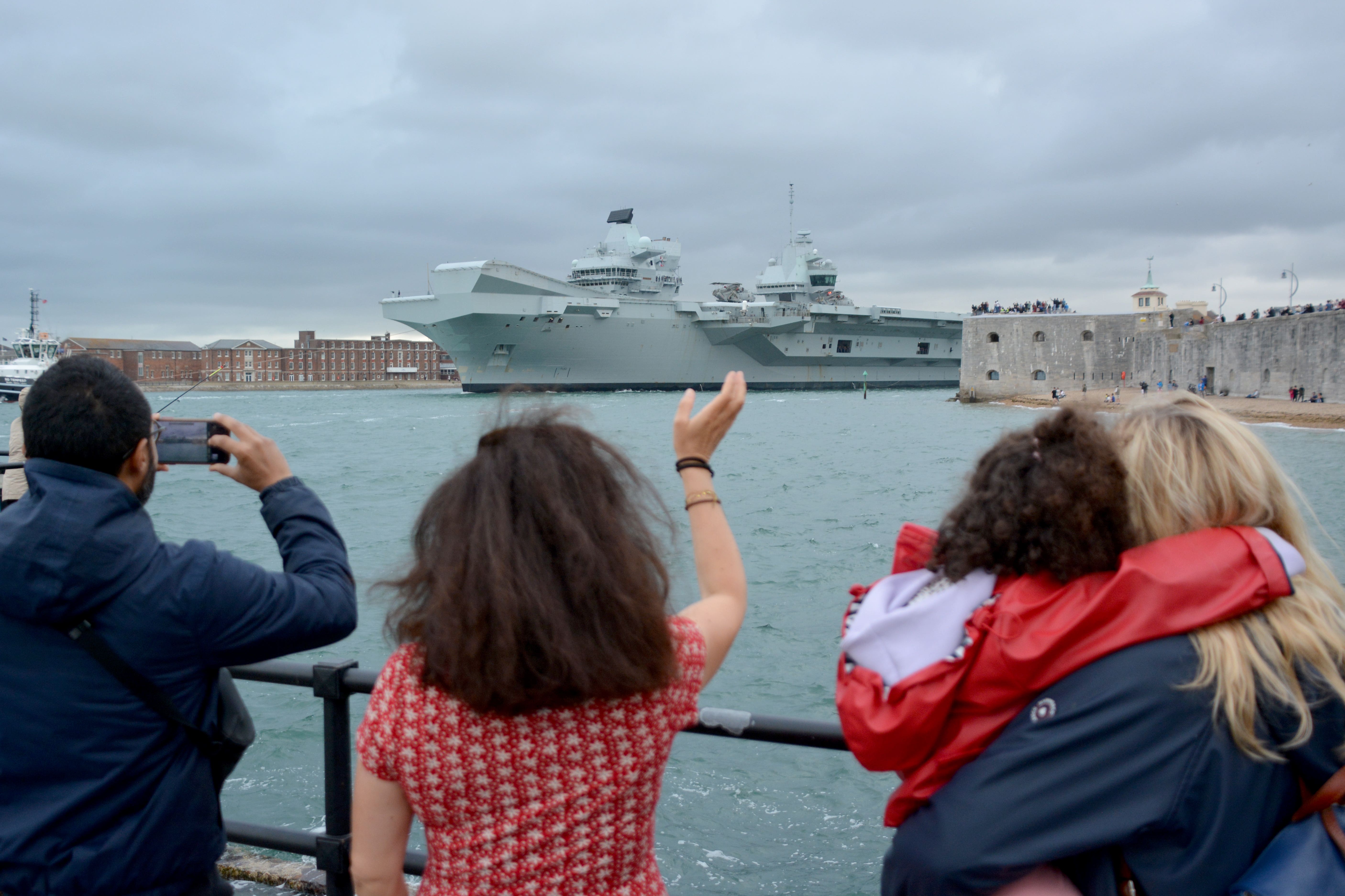 Royal Navy aircraft carrier HMS Queen Elizabeth leaves Portsmouth Harbour (Ben Mitchell/PA)