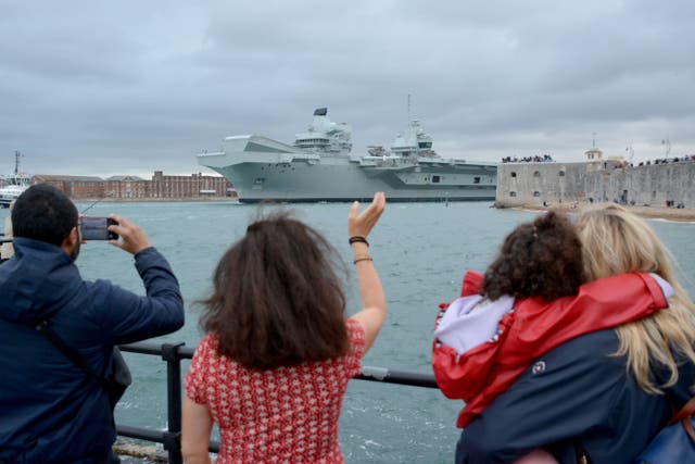 Royal Navy aircraft carrier HMS Queen Elizabeth leaves Portsmouth Harbour (Ben Mitchell/PA)