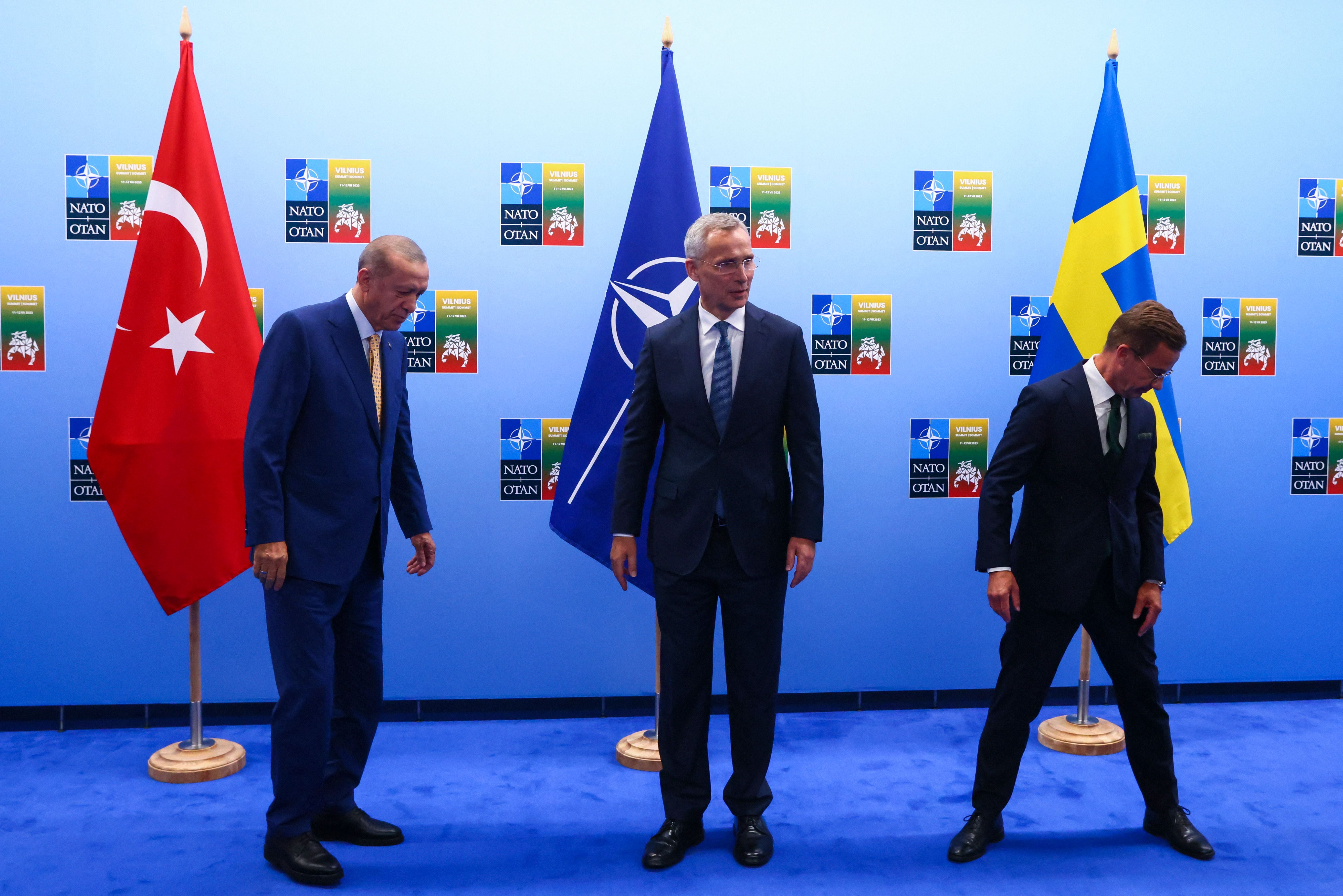 Turkish President Tayyip Erdogan, NATO Secretary-General Jens Stoltenberg and Swedish Prime Minister Ulf Kristersson prior to their meeting on the eve of a NATO summit