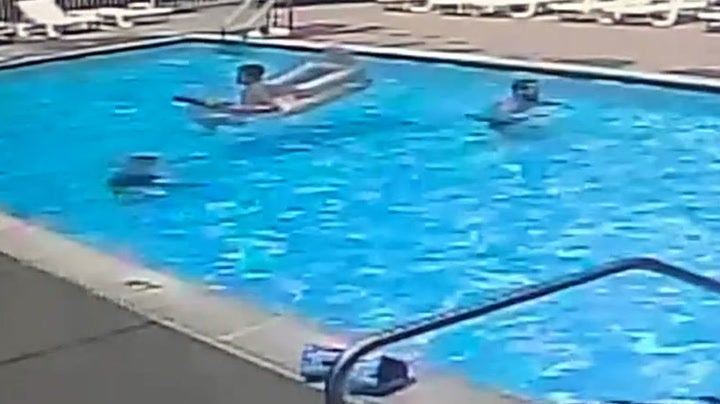 Children save drowning seven-year-old as unaware adult swims past News Independent TV