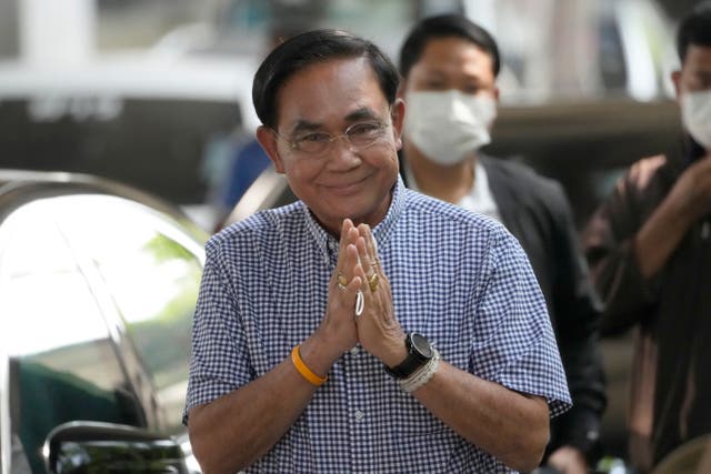 <p>File. Thailand’s Prime Minister Prayuth Chan-ocha arrives to cast his vote during a general election at a polling station in Bangkok, Thailand, on 14 May 2023</p>