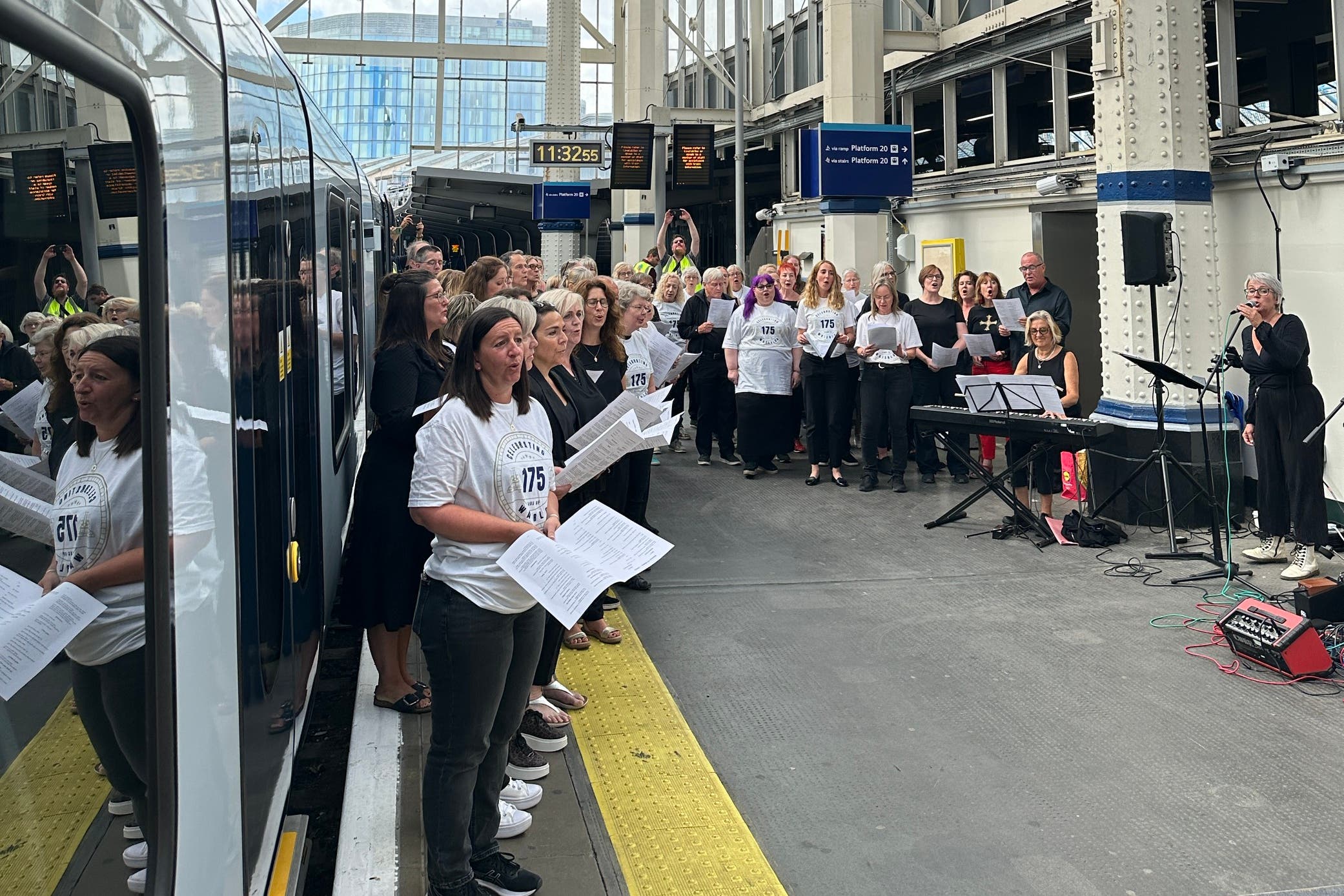 Network Rail and South Western Railway staff formed a choir to serenade passengers at London Waterloo to mark the station’s 175th anniversary (Network Rail/PA)