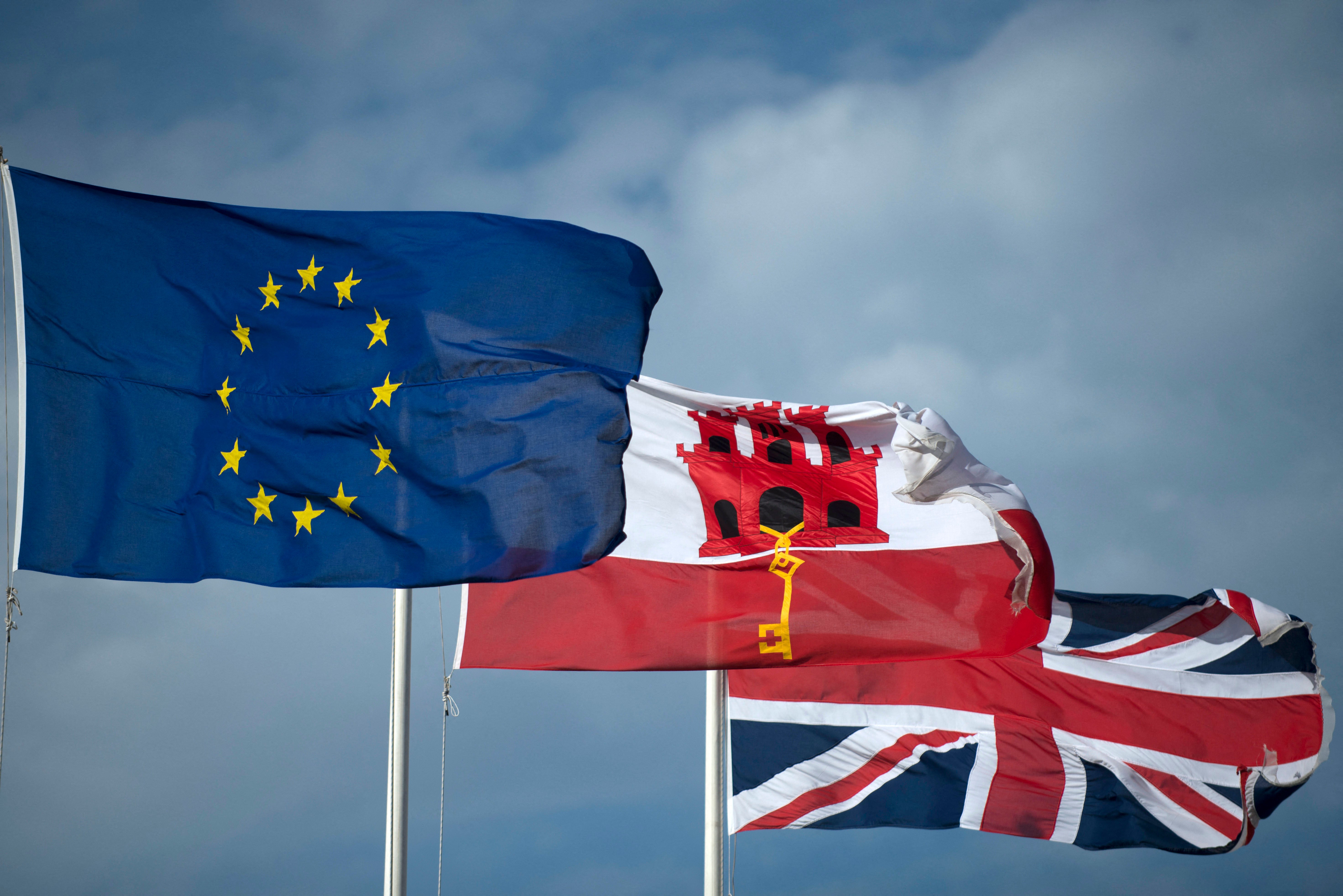 British and EU flags fly next to Gibraltar’s flag