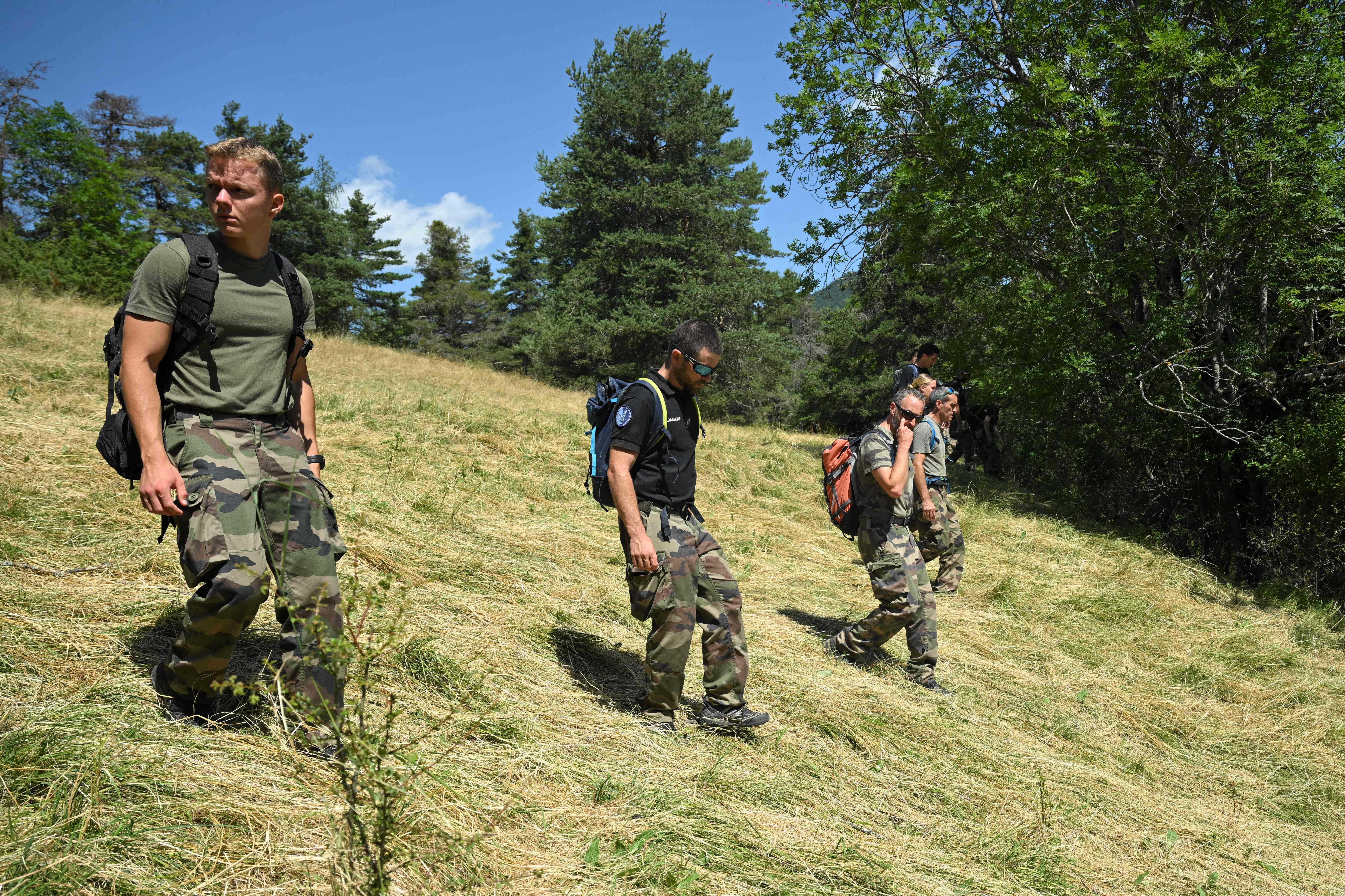 French gendarmes take part in a search operation for two-and-a-half-year-old Emile who is now reported missing for over five days