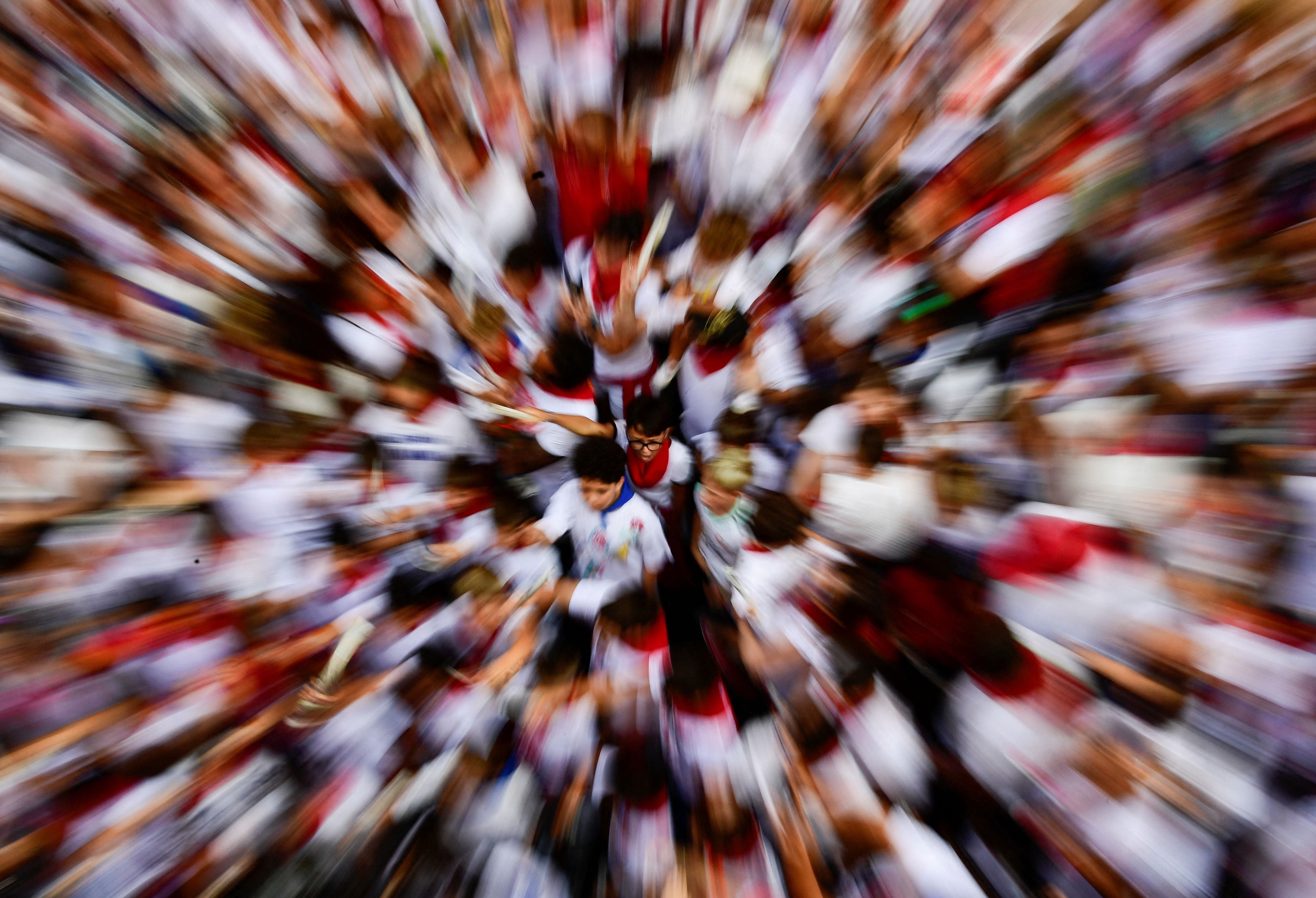 Children prepare to run in the "Encierro Txiki" (Small Bull Run) during the San Fermin festival in Pamplona, northern Spain