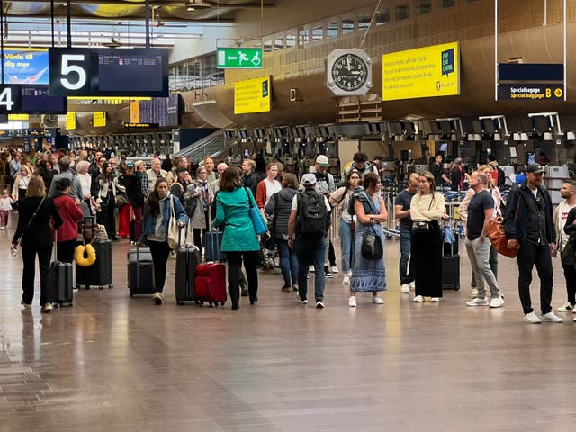 <p>Departing soon? Passengers at Stockholm Arlanda airport – and yes, that long line of people is the queue for security </p>