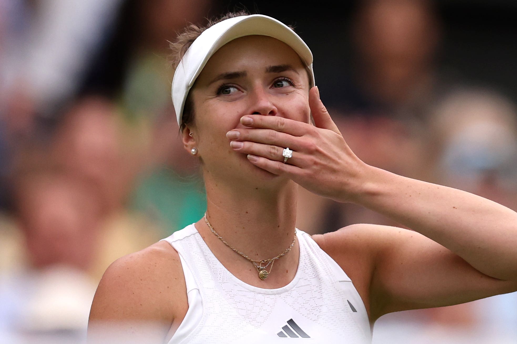 Elina Svitolina celebrates victory over Iga Swiatek in the Wimbledon quarter-finals (Steven Paston/PA)