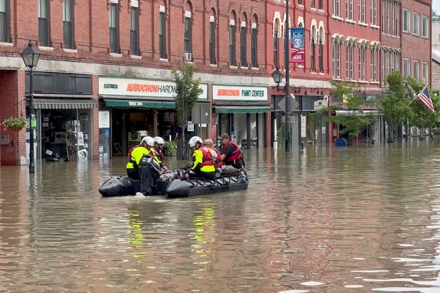 <p>Emergency services work following flooding, in Montpelier, Vermont</p>